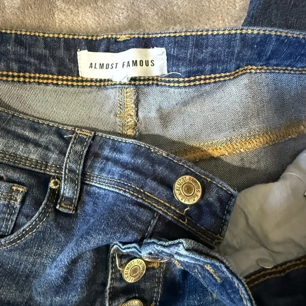 ~Almost Famous Dark Blue Distressed Skinny Jeans